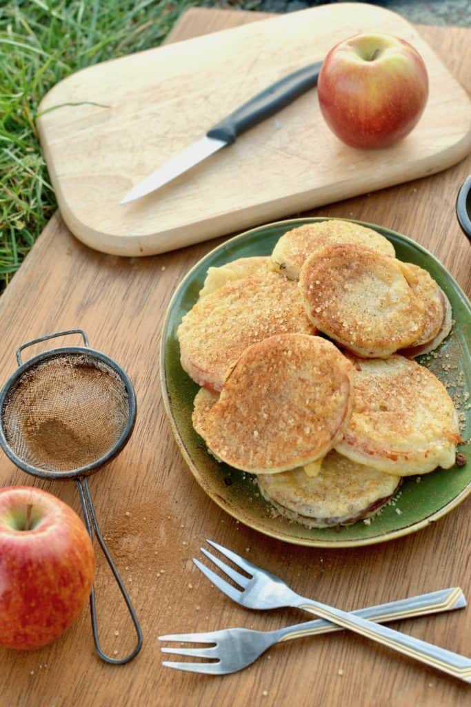 Making apple fritters on a camping trip