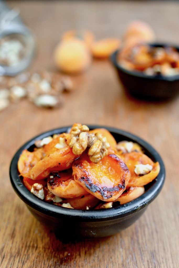 The juicy, caramelised skin of a grilled apricot
