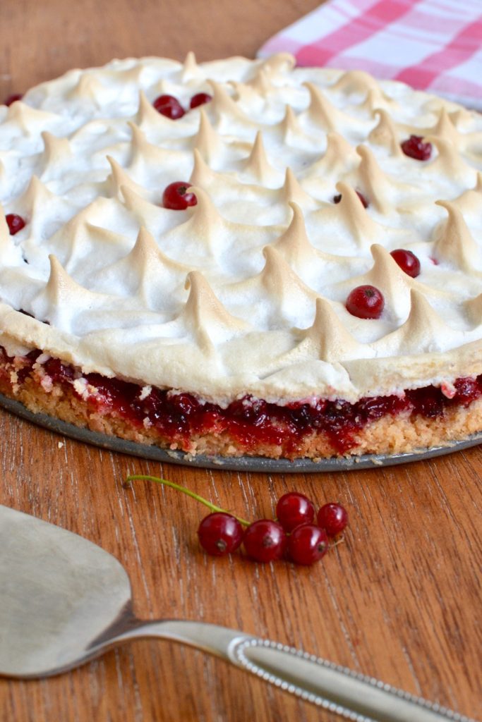 The three layers of the tart - crunchy base, juicy redcurrants, and aquafaba meringue topping.