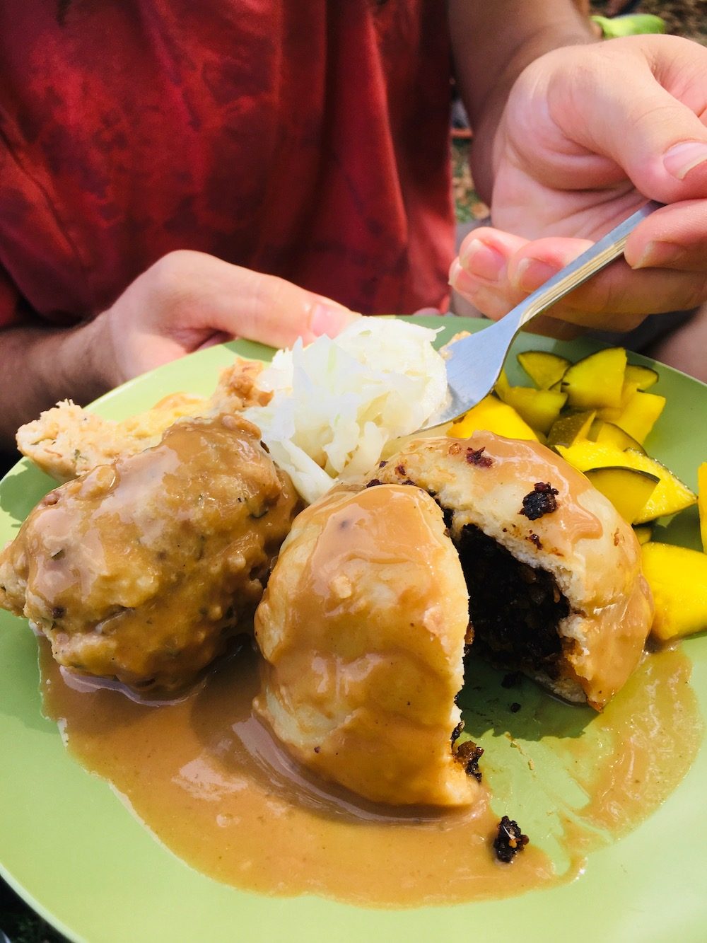 Traditional Austrian filled dumpling with gravy