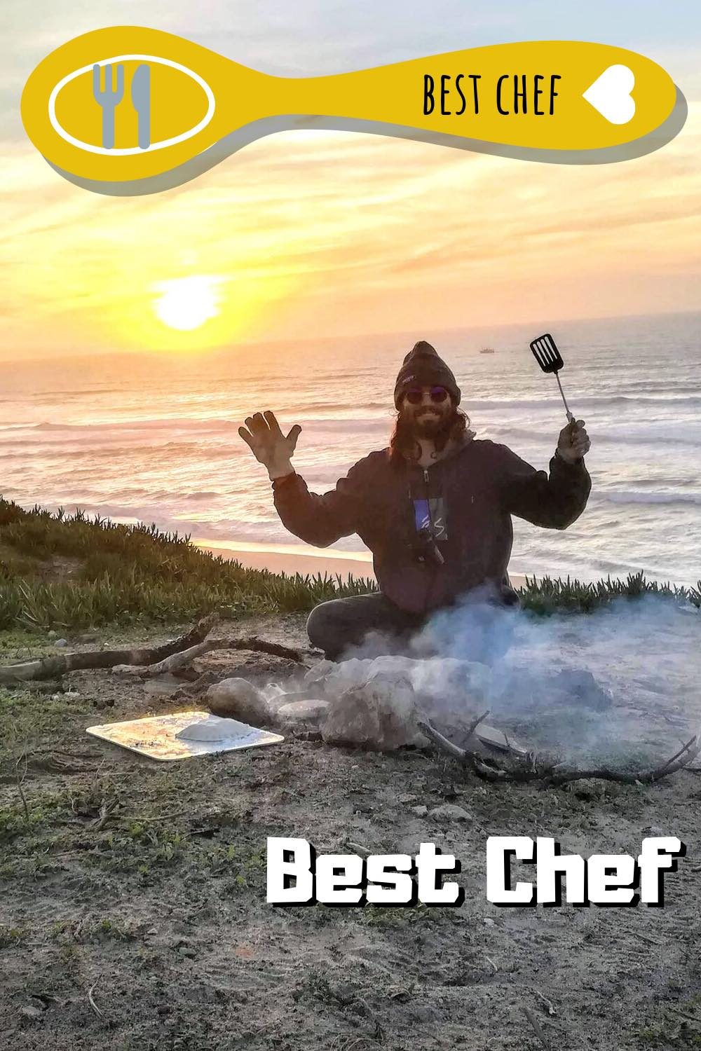 Paul cooking on a campfire on a cliff by the sea