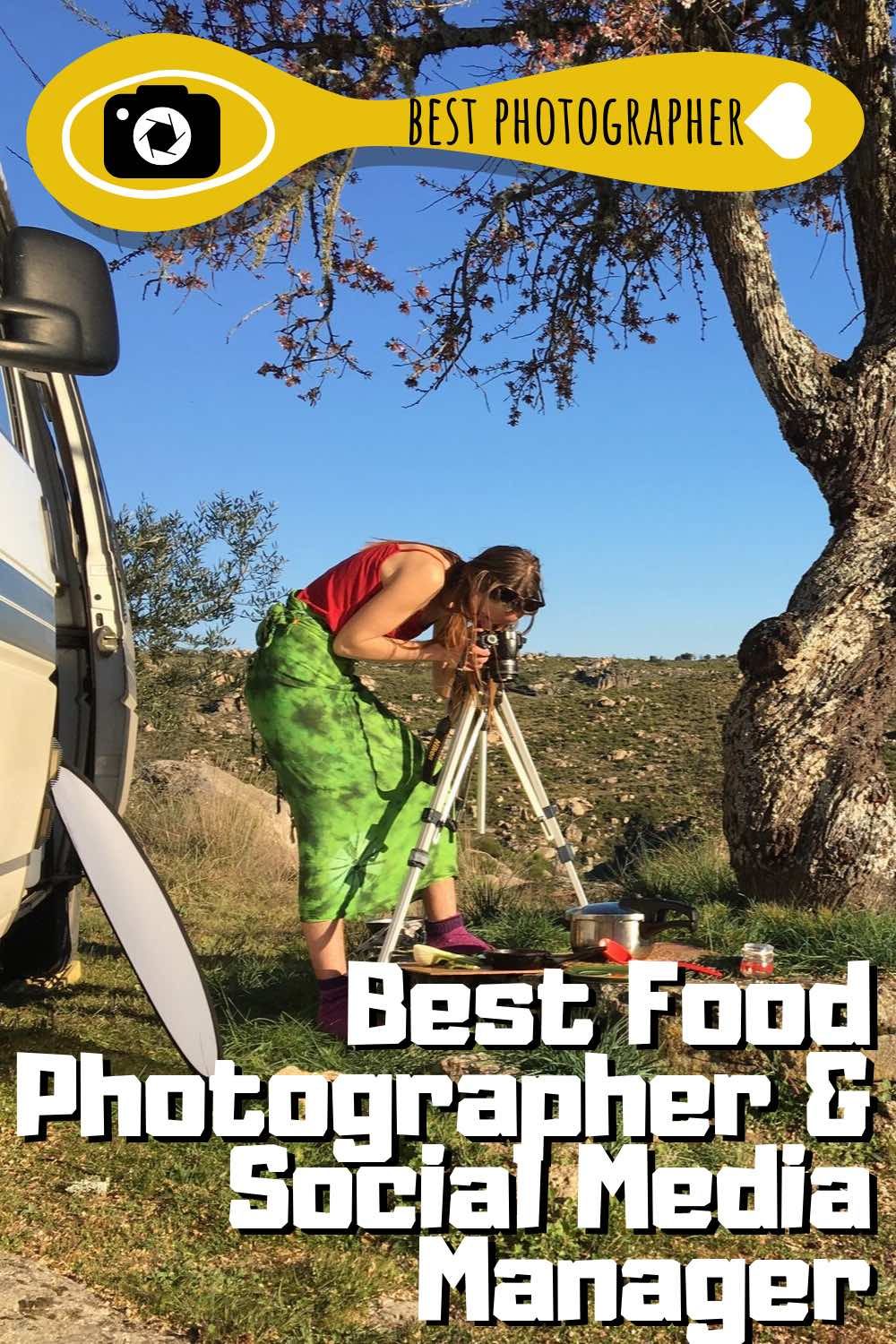 Sophie taking a picture of food nicely plated up on a wooden board outside the open campervan door.