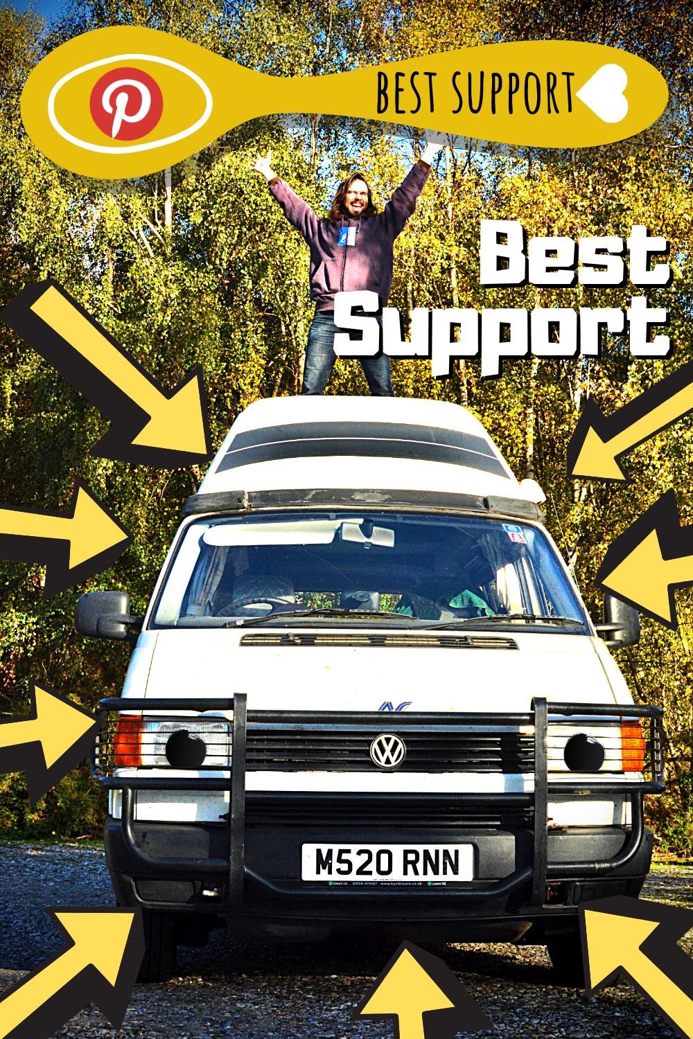 Ronnie the campervan is smiling at the camera. Paul is standing on Ronnie, his arms stretched out towards the sky. Best support!