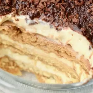 The alternating creamy and biscuity layers of tiramisu, topped with cocoa powder and chocolate