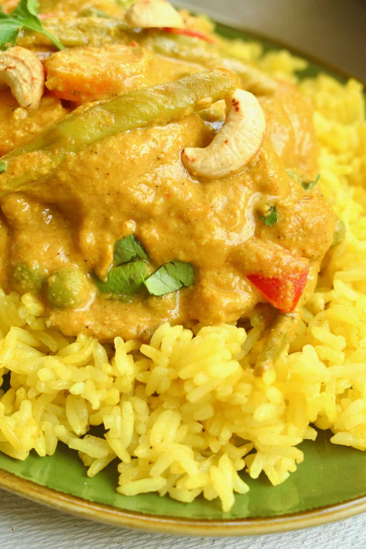 Indian inspired vegan korma on top of baked rice.