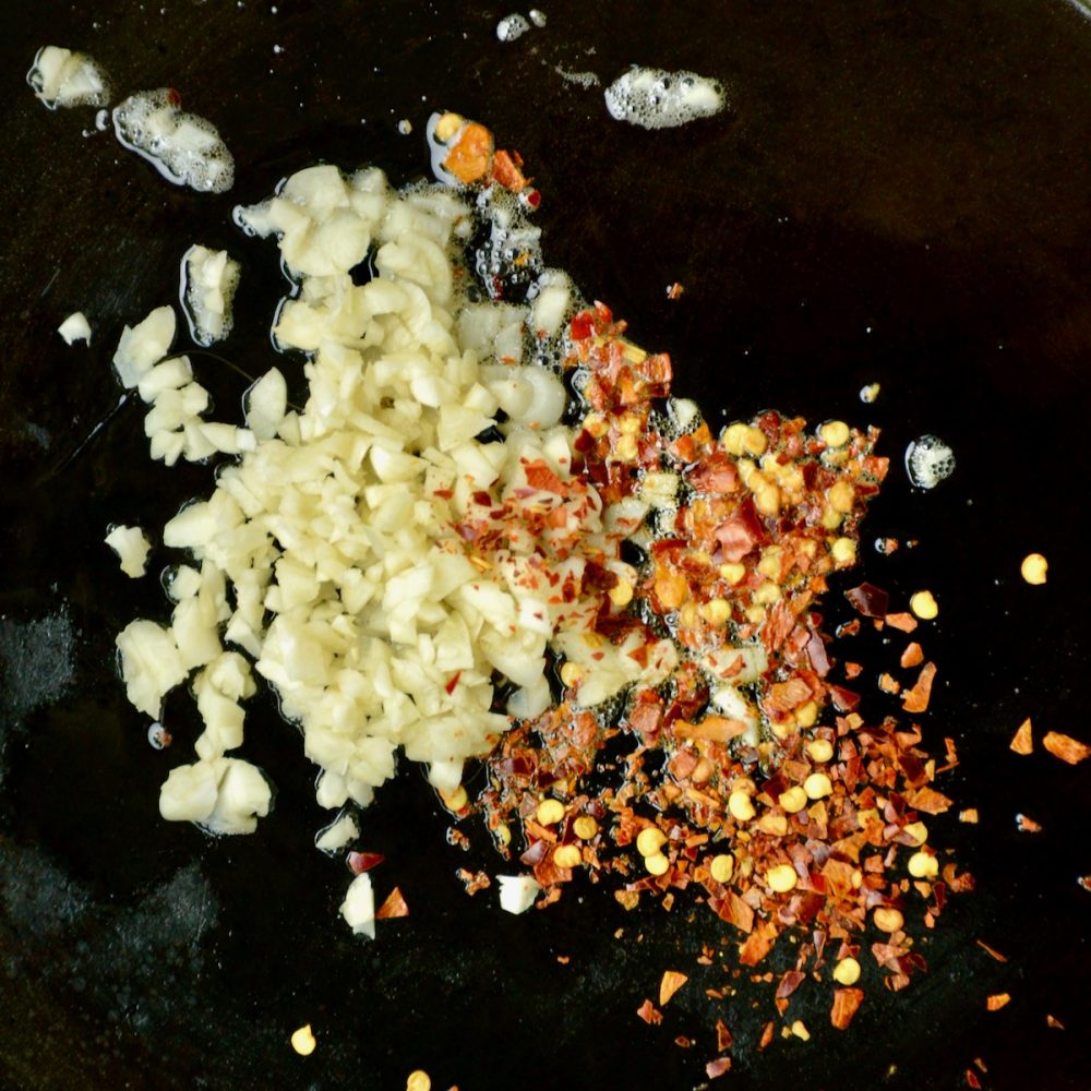 Finely chopped garlic and chili flakes fried in sesame oil.
