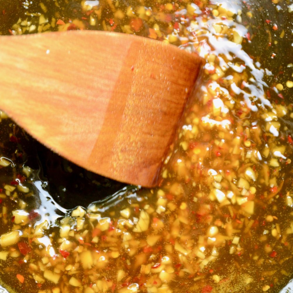 The orange sauce is ready when it has thickened and flows slowly.