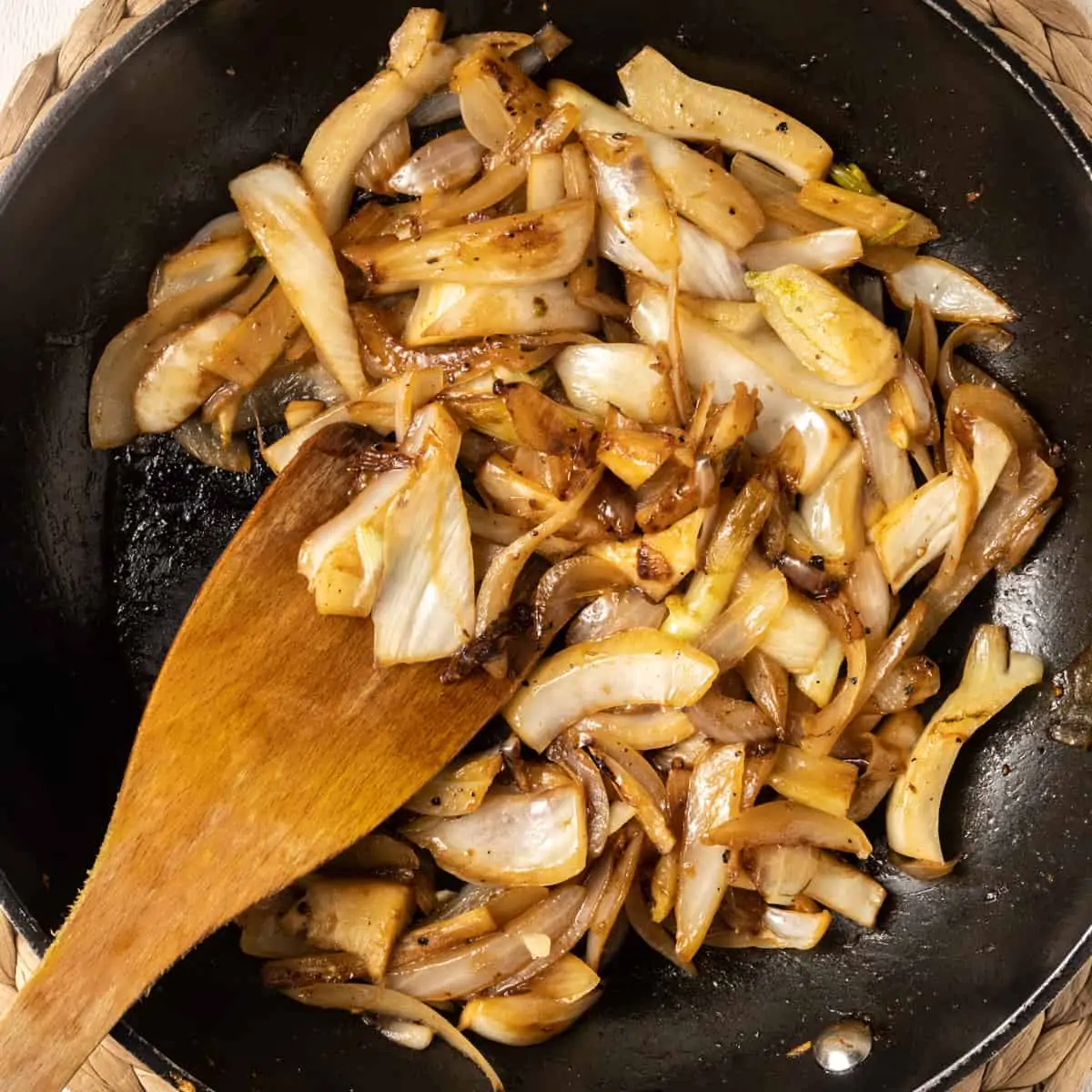 The fennel and onion are caramellised by sauteing in olive oil with some sugar.