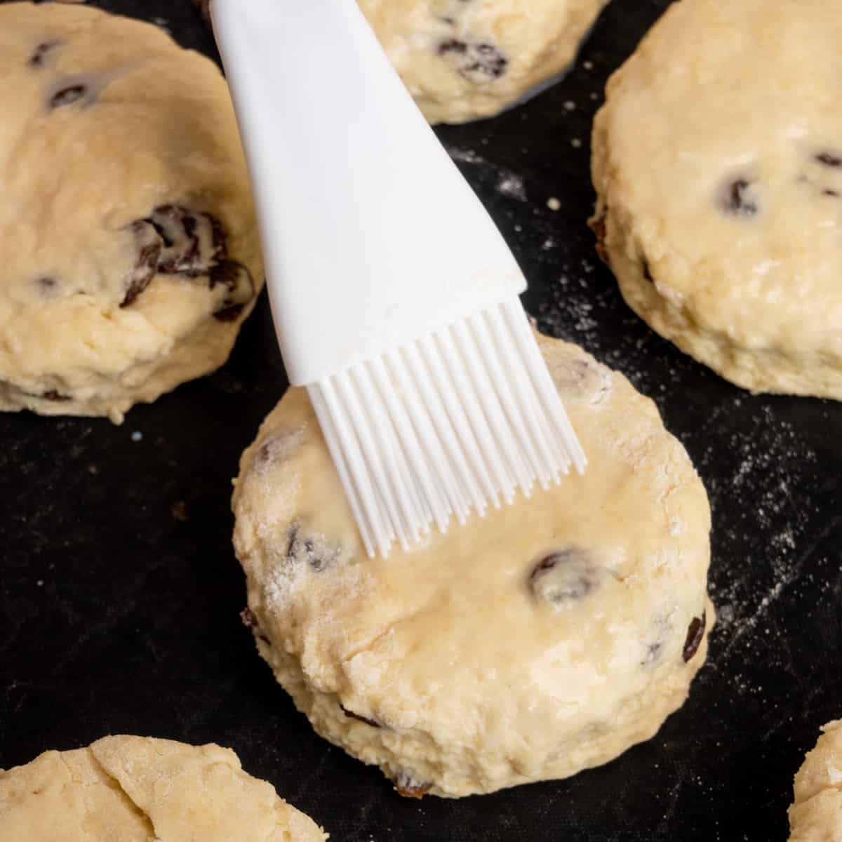 Before baking, the scones are brushed with soy milk and maple syrup.