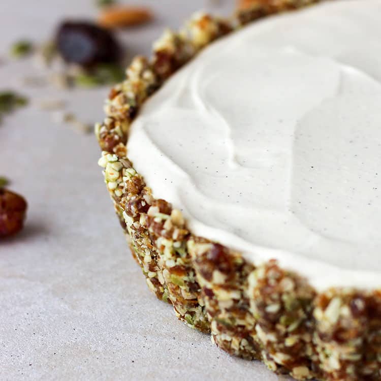 A creamy filling of tofu cheesecake with nut and seed crust.