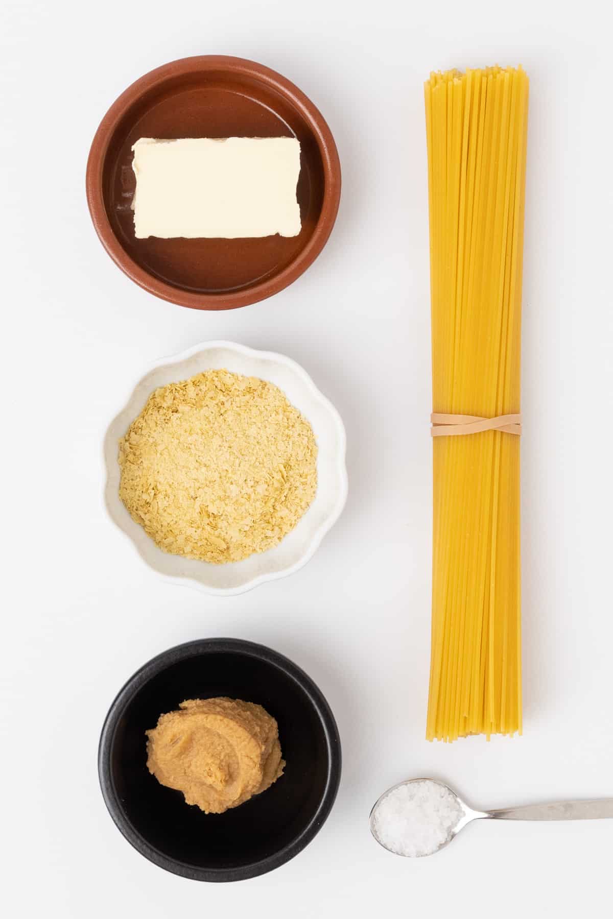 Ingredients for the miso pasta: spaghetti, vegan butter, white miso paste, nutritinonal yeast and salt for cooking the pasta.