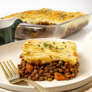 A plated-up slice of lentil shepherds pie.