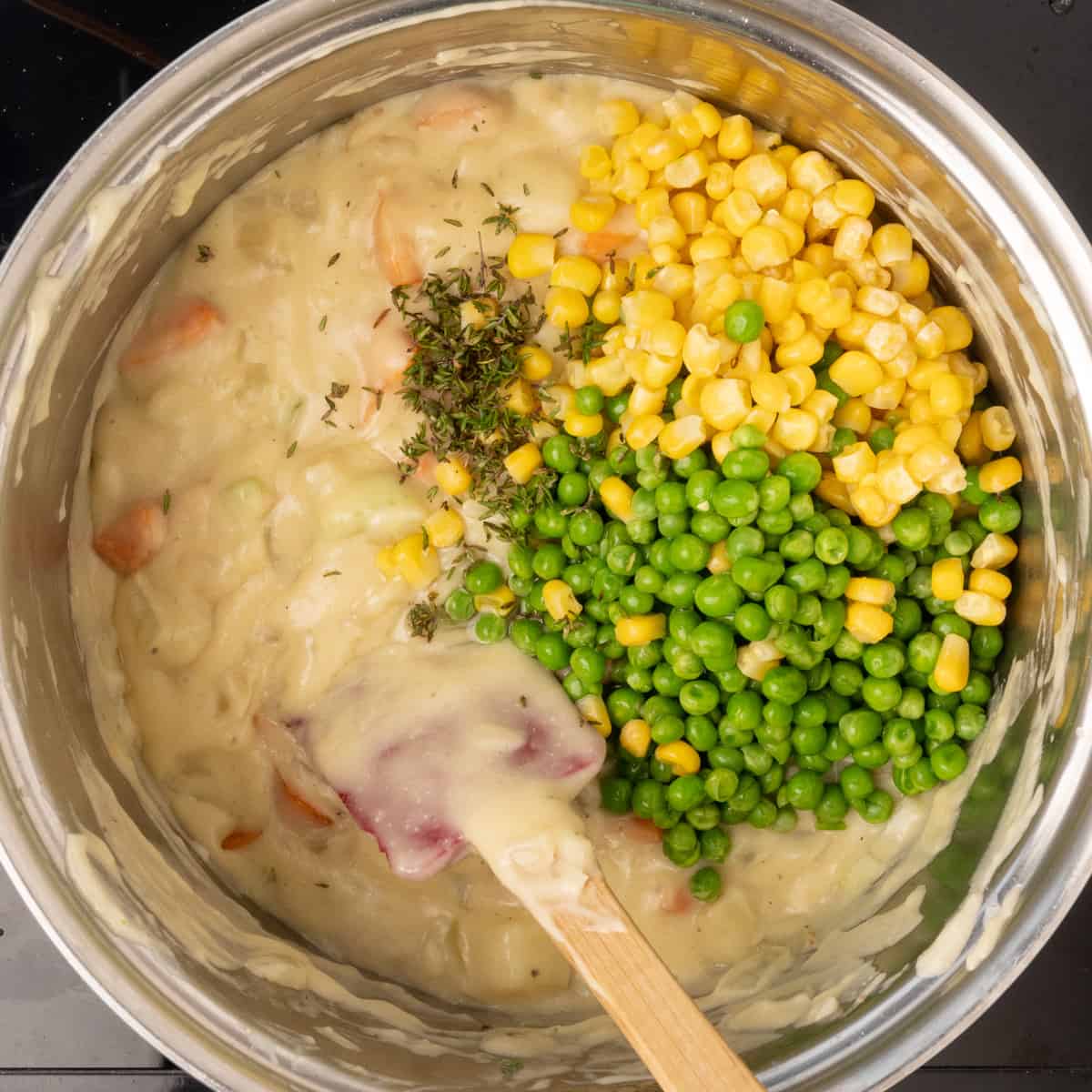 Green peas, sweetcorn and fresh thyme added to a creamy sauce with vegetables.