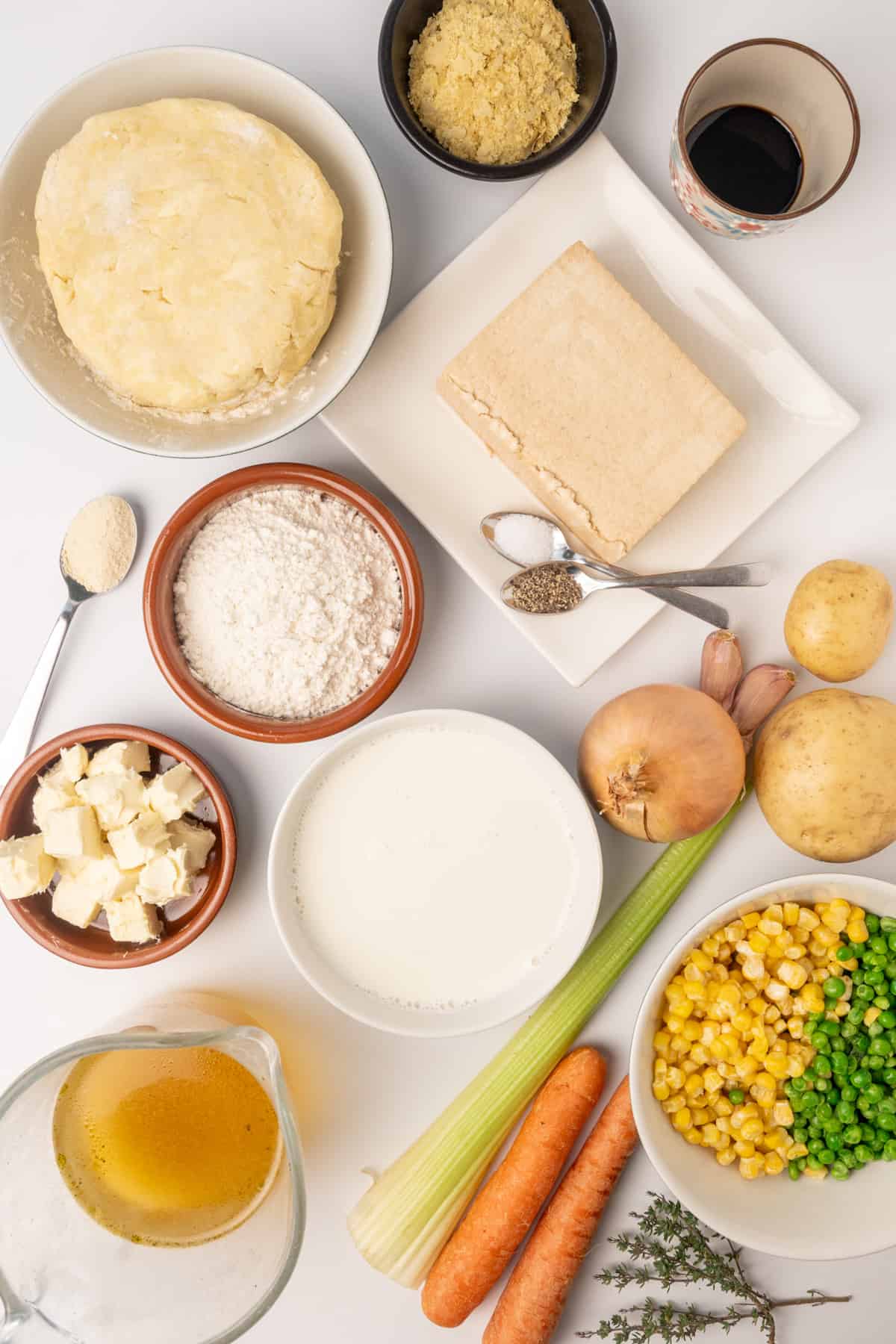 The ingredients for vegan pot pie laid out on a table.