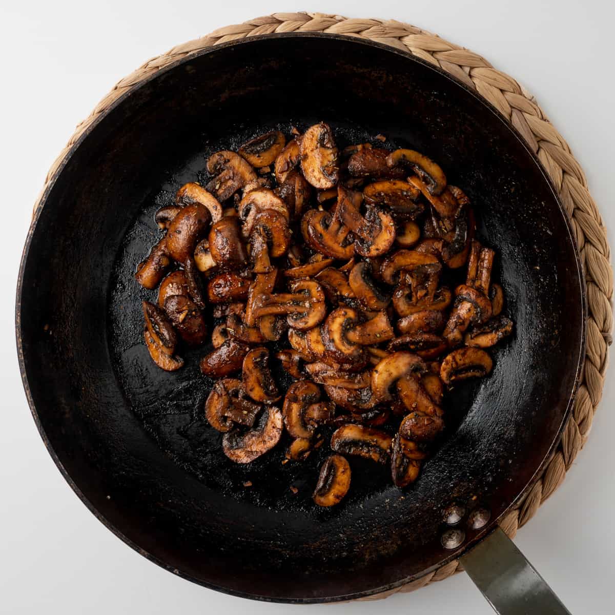 Sauteed mushrooms with the cooked down spice and soy sauce glaze.